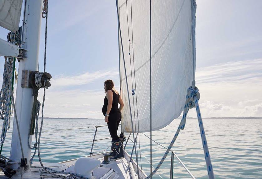 Image of a pregnant woman on a boat