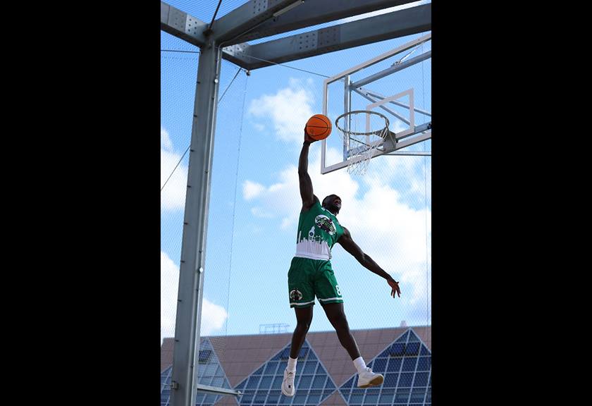 Image of a basketball player doing a dunk