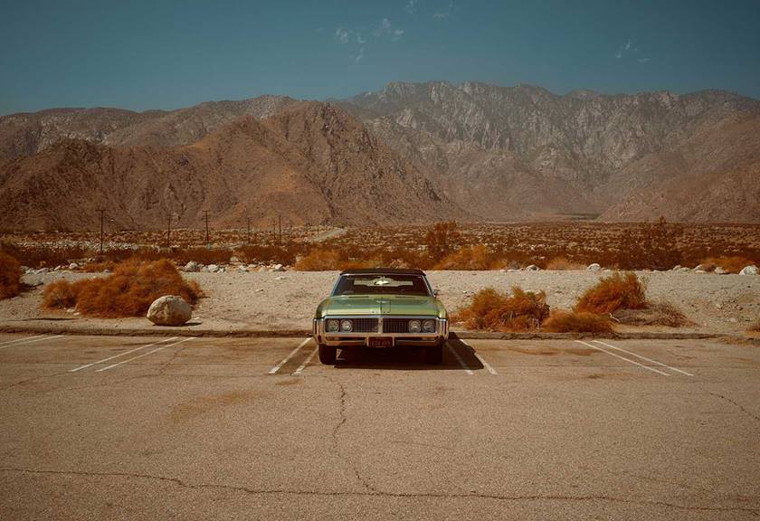 Scenic image of a car in the middle of a car park