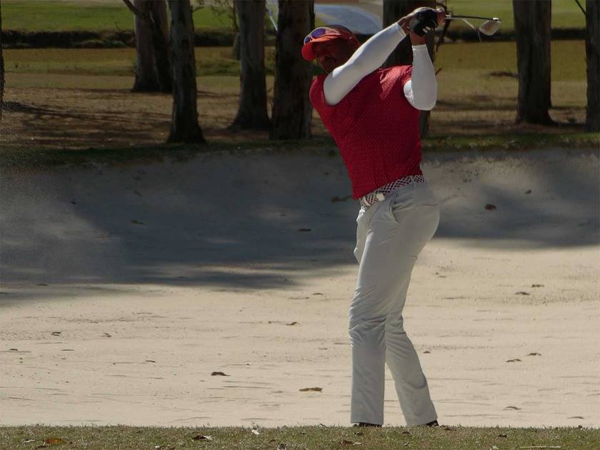 Image of a golf player in action