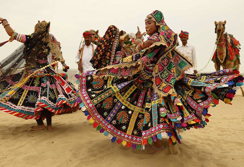 Image of dancers with colourful outfits