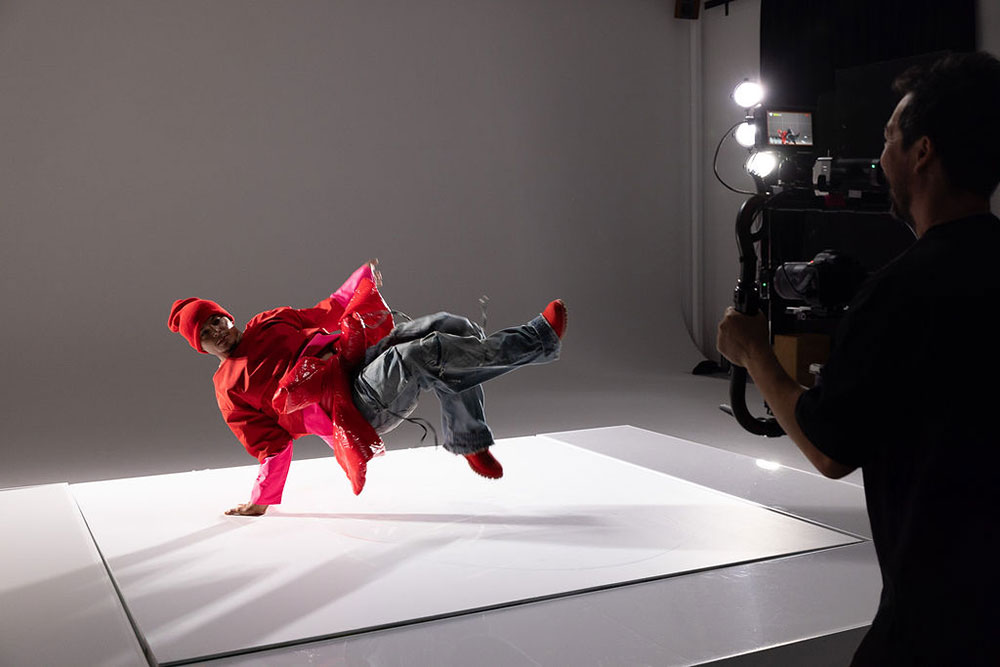 Steven Chee filming a dancer doing moves